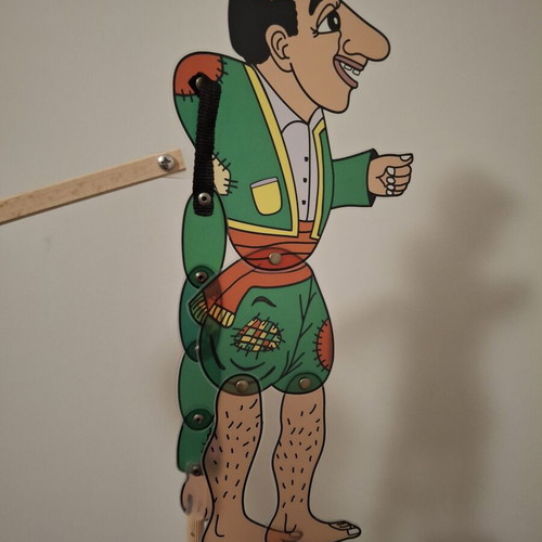 Karagiozis shadow theatre figure with wooden springs