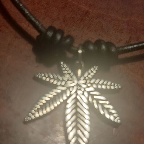 Steel pendant with marijuana leaf and adjustable black leather strap new