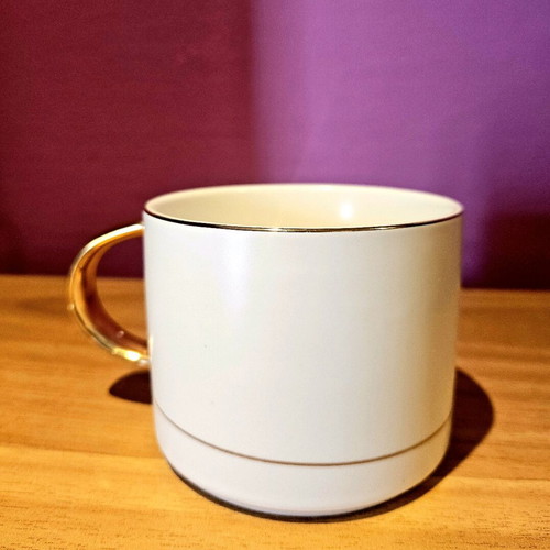Cup like new with gold finish