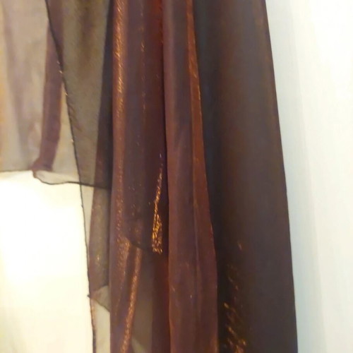 Dark brown scarf used with shimmer and fringes