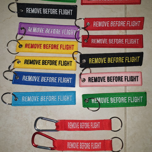 Remove before flight keychains new, various colors, from 4 each