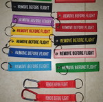Remove before flight keychains new, various colors, from 4 each