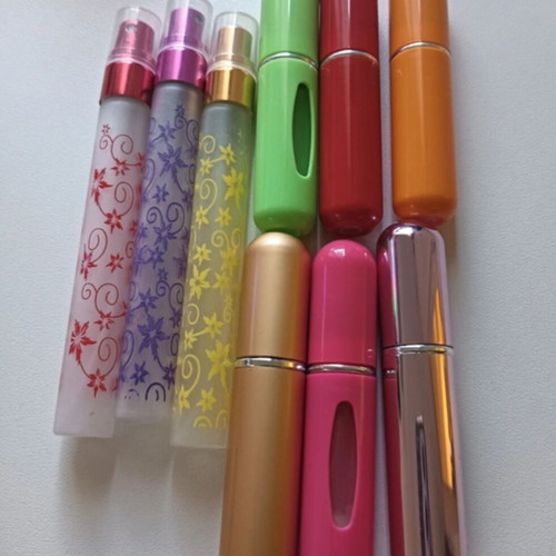 Perfume bottles set of 9 like new, travel size