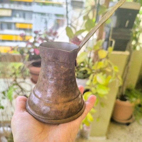 Handmade old copper briki for Greek or Turkish coffee used