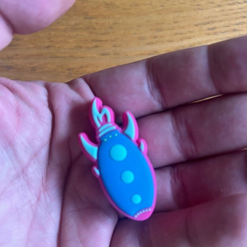 Authentic rocket pin for Crocs, like new, pink and blue
