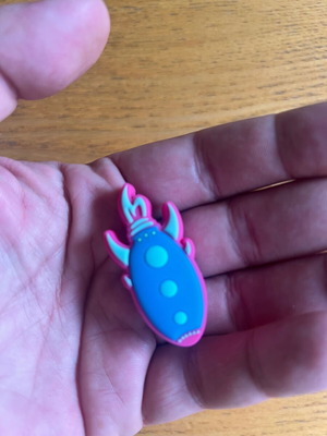Authentic rocket pin for Crocs, like new, pink and blue