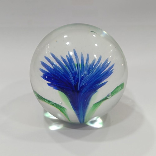 Vintage handmade art glass paperweight with blue flower