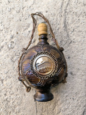 Decorative flask 1965 like new with embossed Parthenon design