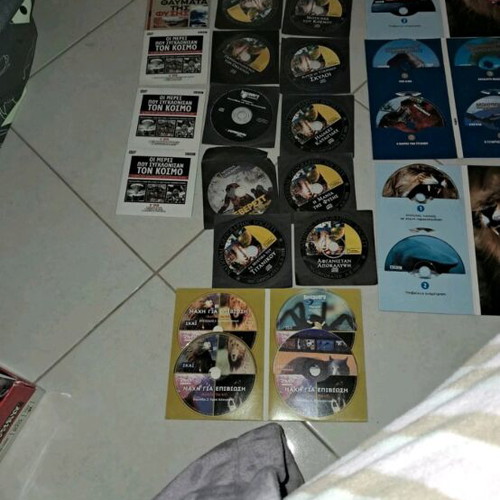 National Geographic and Discovery documentary collections, like new, 15 sets