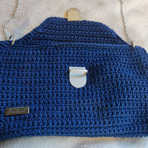 Knitted shoulder bag new blue with silver details