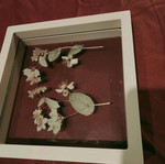 Transparent frame with dried flower composition like new