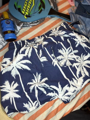 Men's tropical swim shorts with palm trees, like new, blue and white
