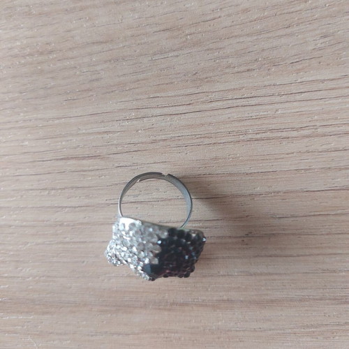 Skull ring like new with black and clear crystals, adjustable