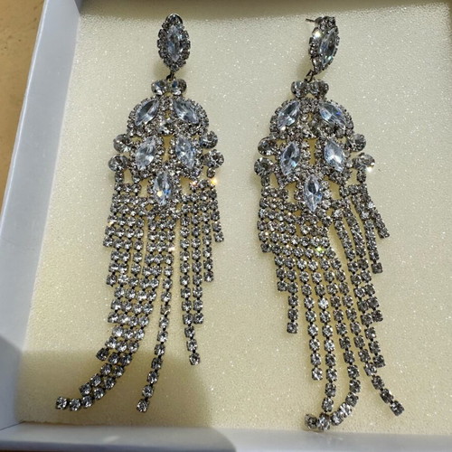 Earrings new with crystals, silver color