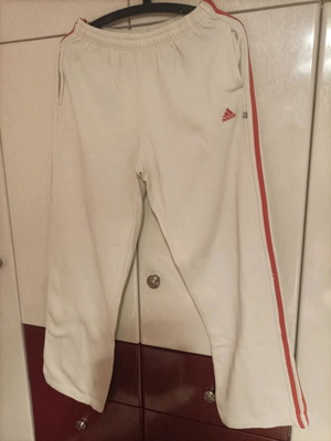 Adidas women's sweatpants used, beige with orange stripes