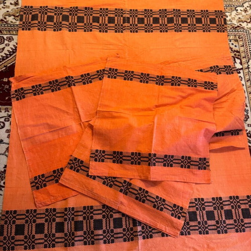 Handwoven tablecloth and napkin set from grandmother's loom