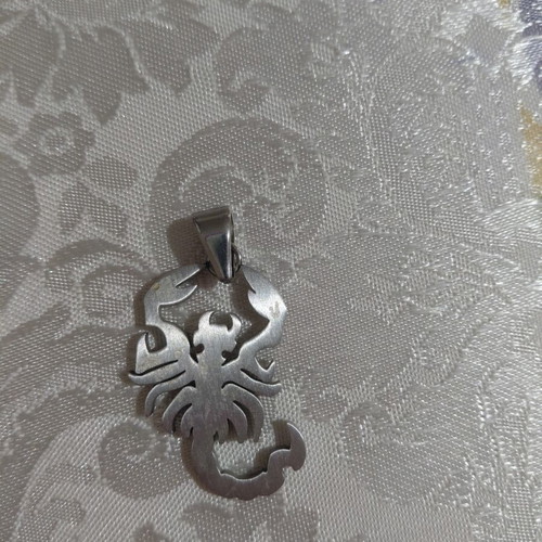 Scorpio charm pendant like new, silver color