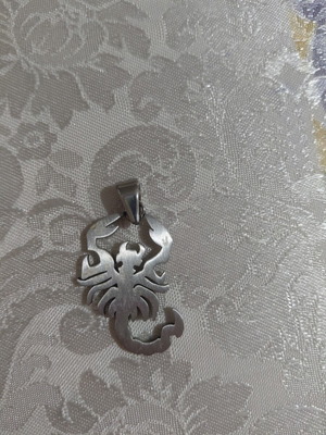 Scorpio charm pendant like new, silver color