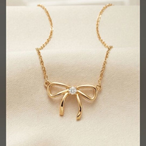 Heart and Bow Necklace like new, gold plated