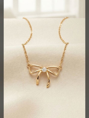 Heart and Bow Necklace like new, gold plated
