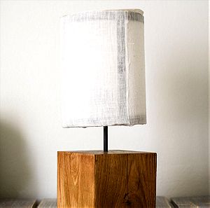 Custom table lamp made by walnut wood.