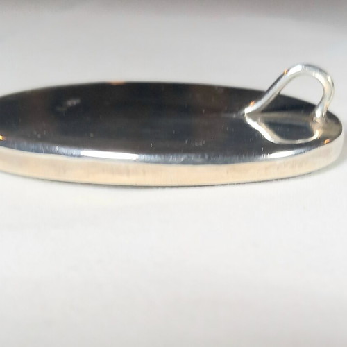 Silver pendant and mother of pearl