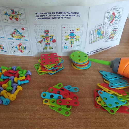 Battery-Powered Screwdriver Toy like new with shapes and screws