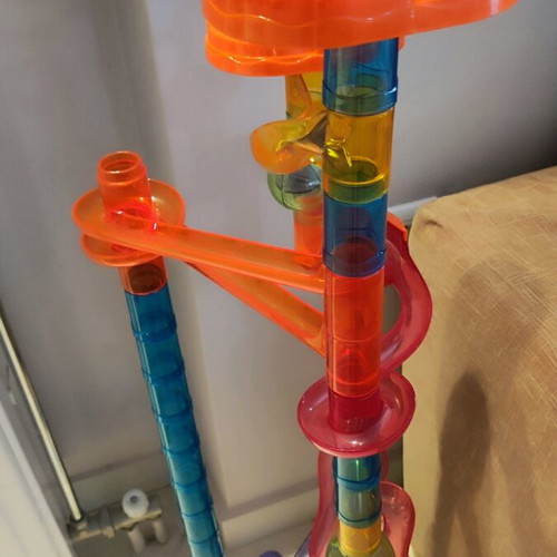 Marble run toy used, assembly game with 10 marbles