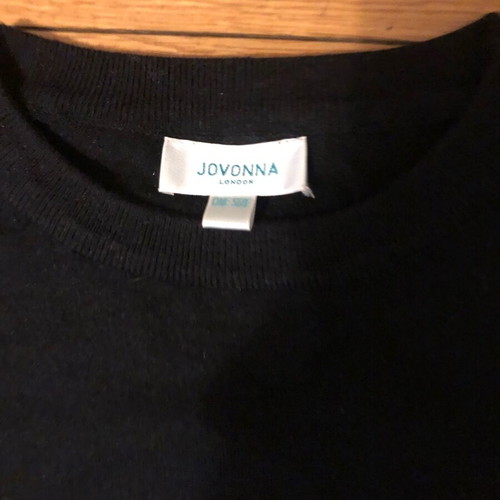 Black evening sweater Jovonna one size like new with transparent sequin sleeves