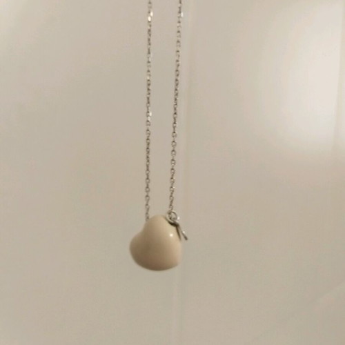 Silver delicate necklace like new with heart pendant and thin chain