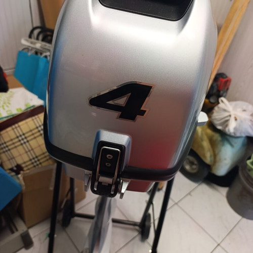 Honda outboard motor 4 hp upgraded to 6 hp like new with stand