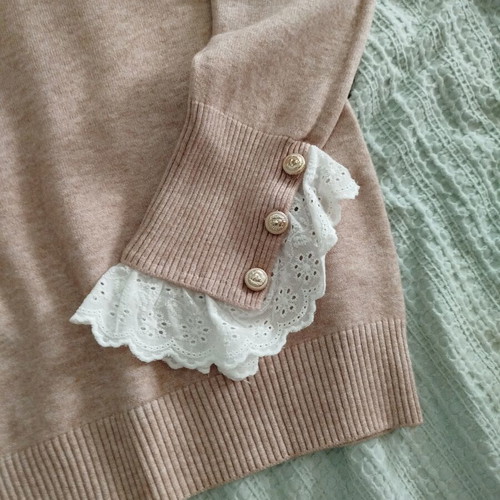 Women's pink pullover like new with lace cuffs and buttons, size L