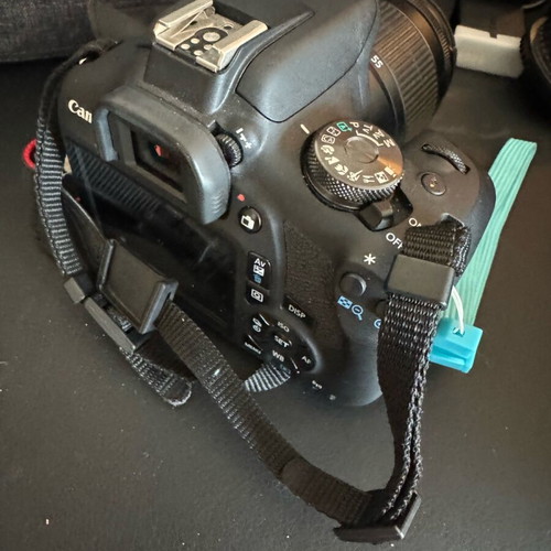 Canon EOS 2000D camera with 3 batteries and extras, like new