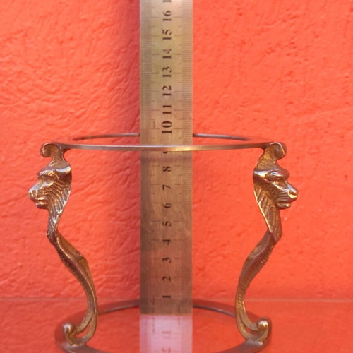 Brass base used with lion heads