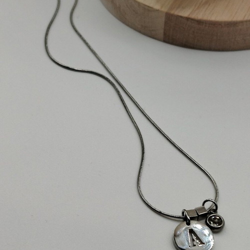 Handmade necklace new from crystal and stainless steel with silver monogram