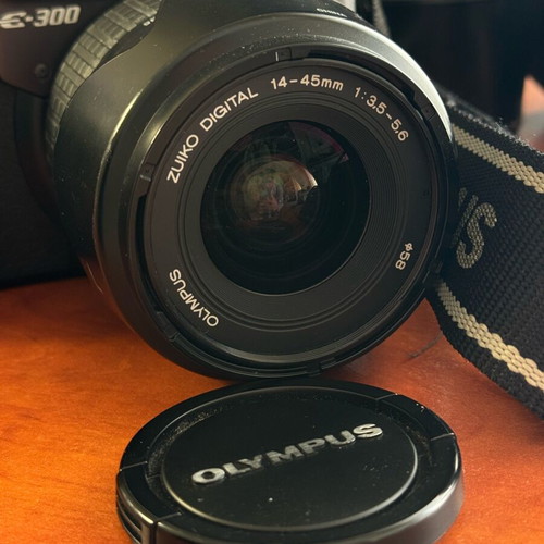 Olympus E-300 DSLR used with Zuiko Digital 14-45mm and 40-150mm lenses