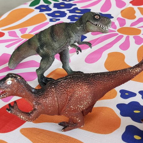Plastic dinosaur toys used, all together