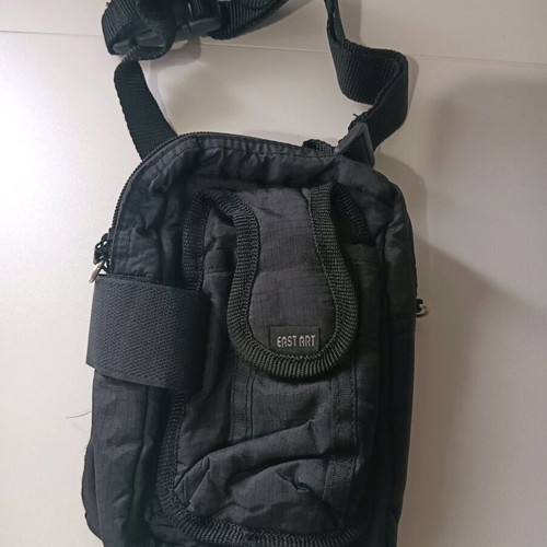 Waist bag used, black fabric with phone and pen holder