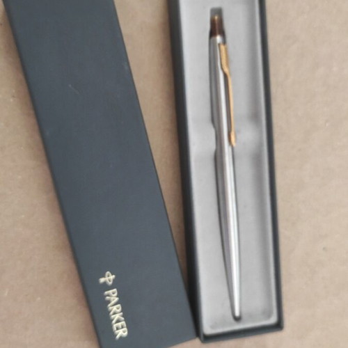 Parker pen used, silver with gold