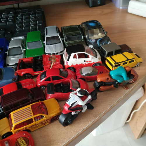 Iron toy cars like new, pack of 57 with engines