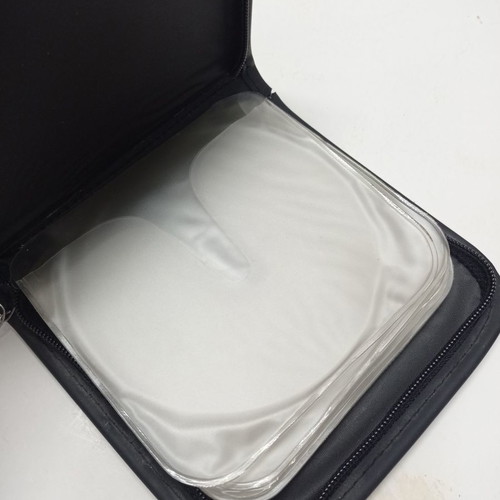 Small CD case used, 12 slots, black and green