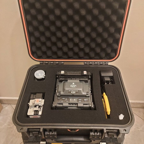 UCL Swift K33 fusion splicer with aftermarket cleaver and stripper