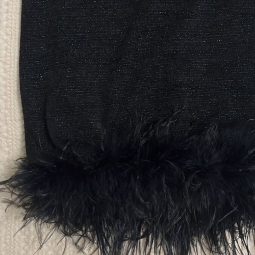 Black mini dress with feathers like new, sleeveless, tight fit