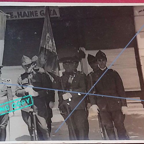 Vintage Romanian military photo with soldiers and officer