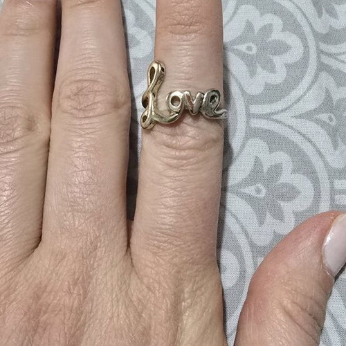 Love ring in gold tone like new