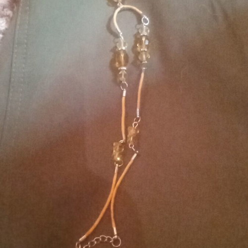 Handmade necklace with amber beads and leaf pendant