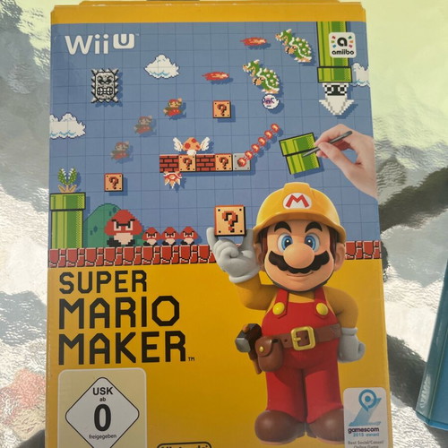 Nintendo Wii U console used with game cartridges and cables