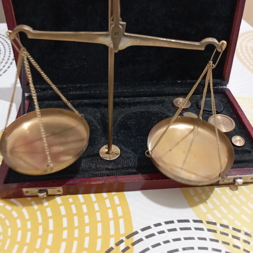 Vintage brass precision scale in wooden case with velvet lining and weights