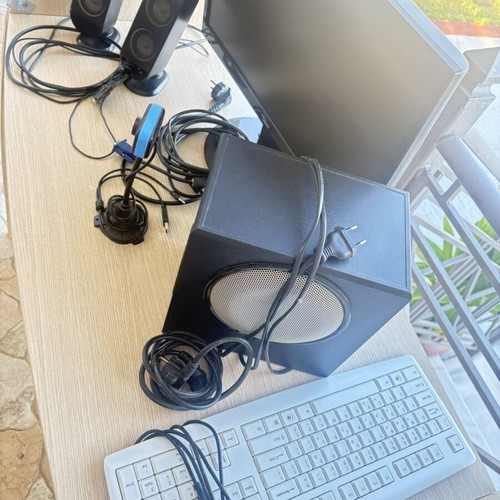 Fujitsu-Siemens computer monitor and Logitech speakers with keyboard and webcam