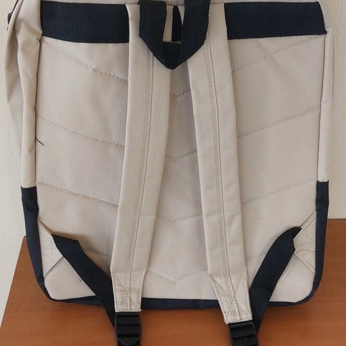 Backpack new, beige and black, durable material